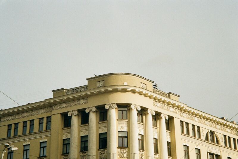 a large building with a clock on the front of it