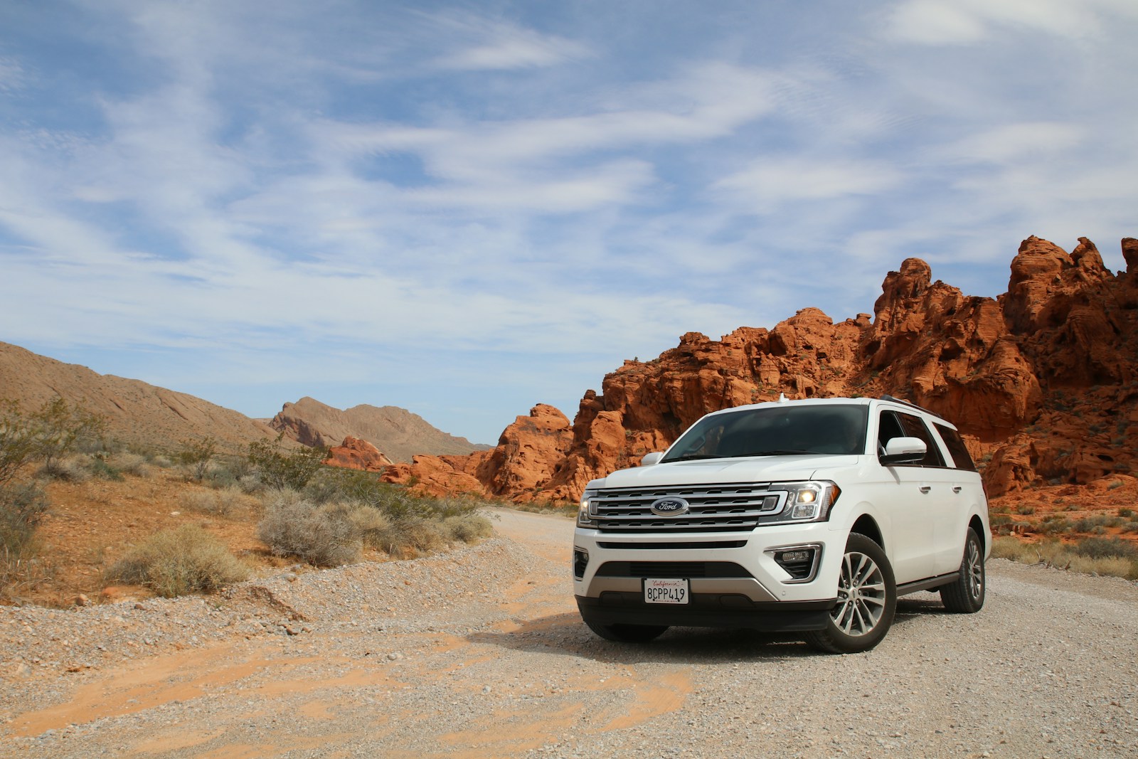 Photo by Sven D parked white Ford Explorer SUV
