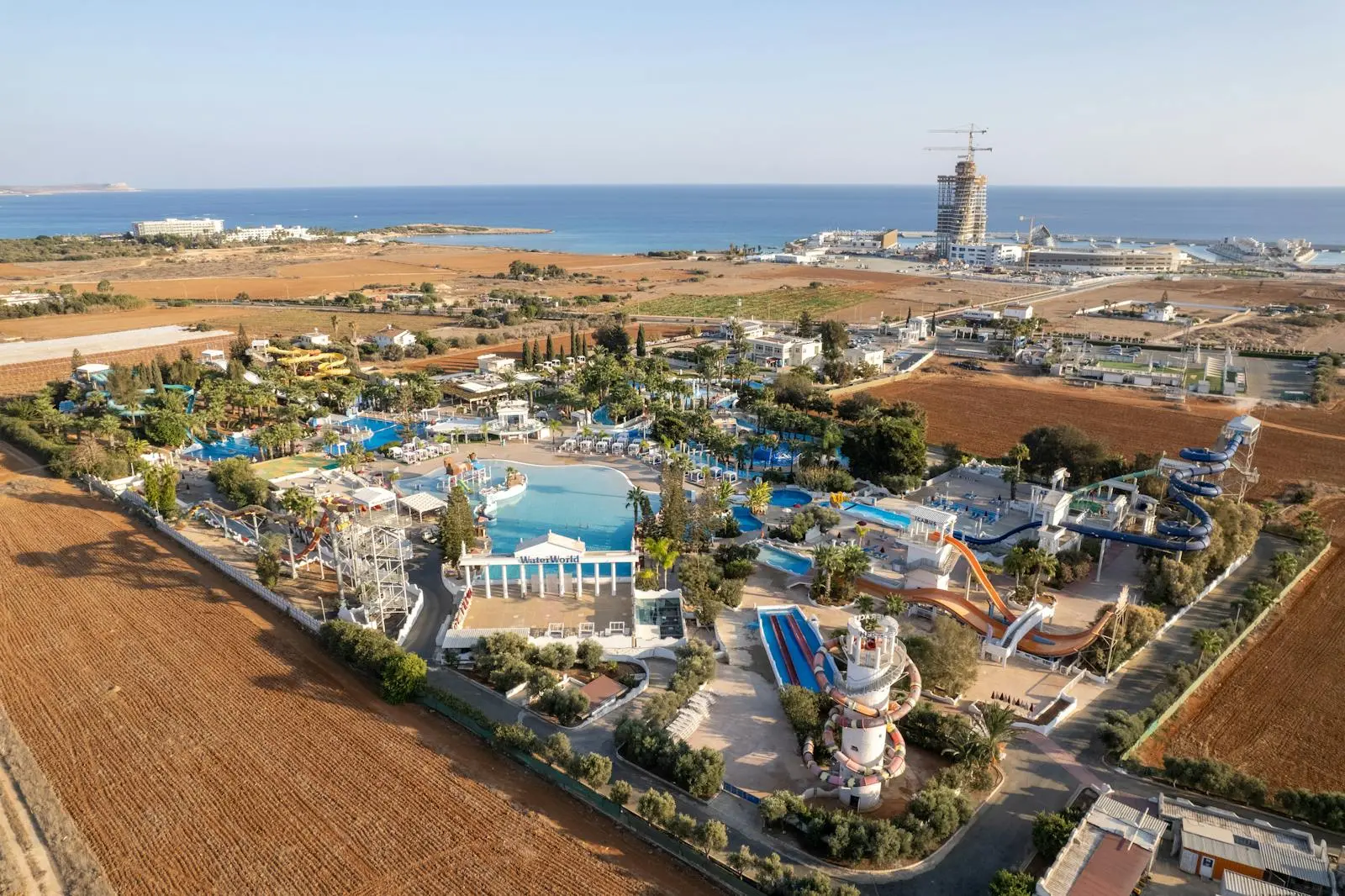 Aerial view of a vibrant waterpark in Ayia Napa, Cyprus, near the beautiful coastline.