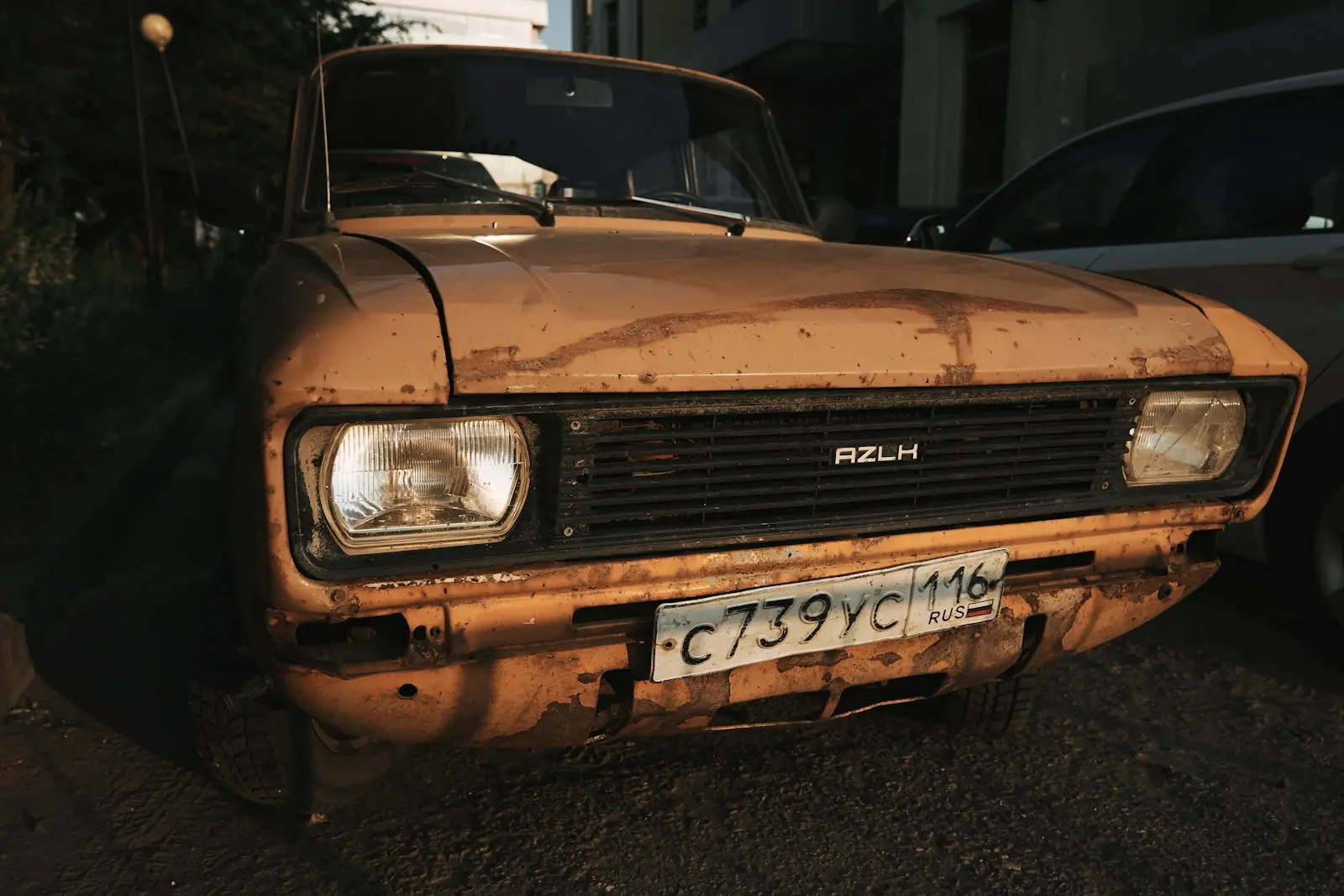 brown and white car on road