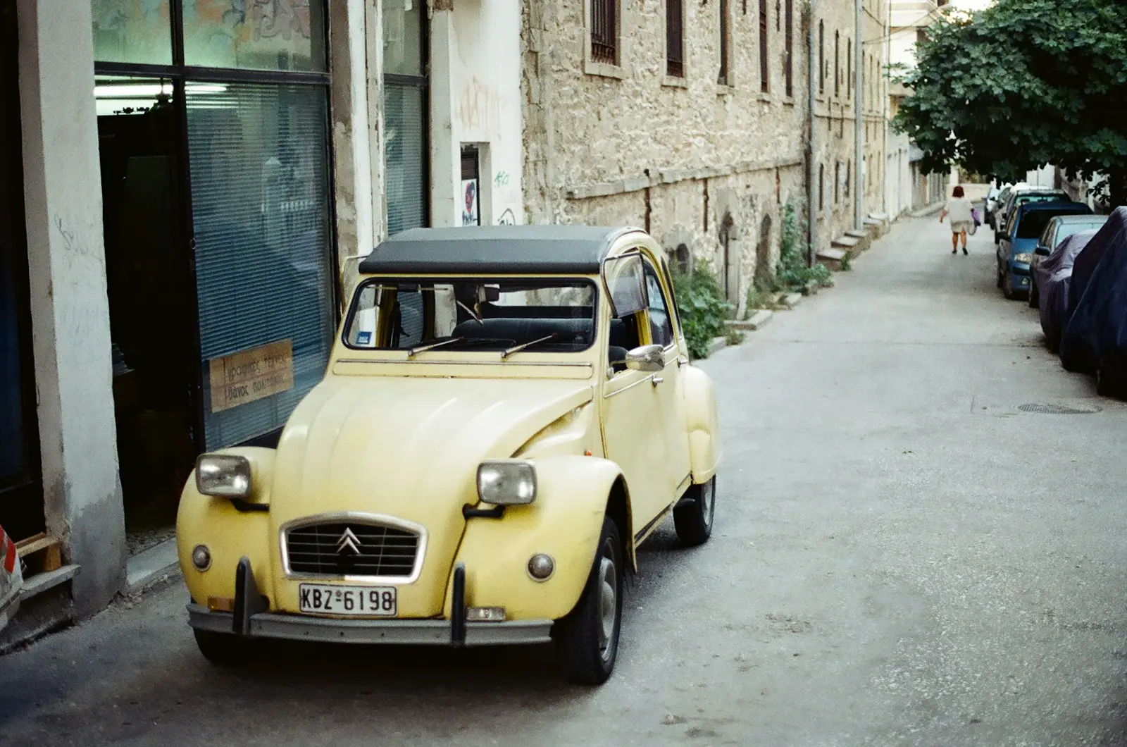 classic Citroen car parked beside building