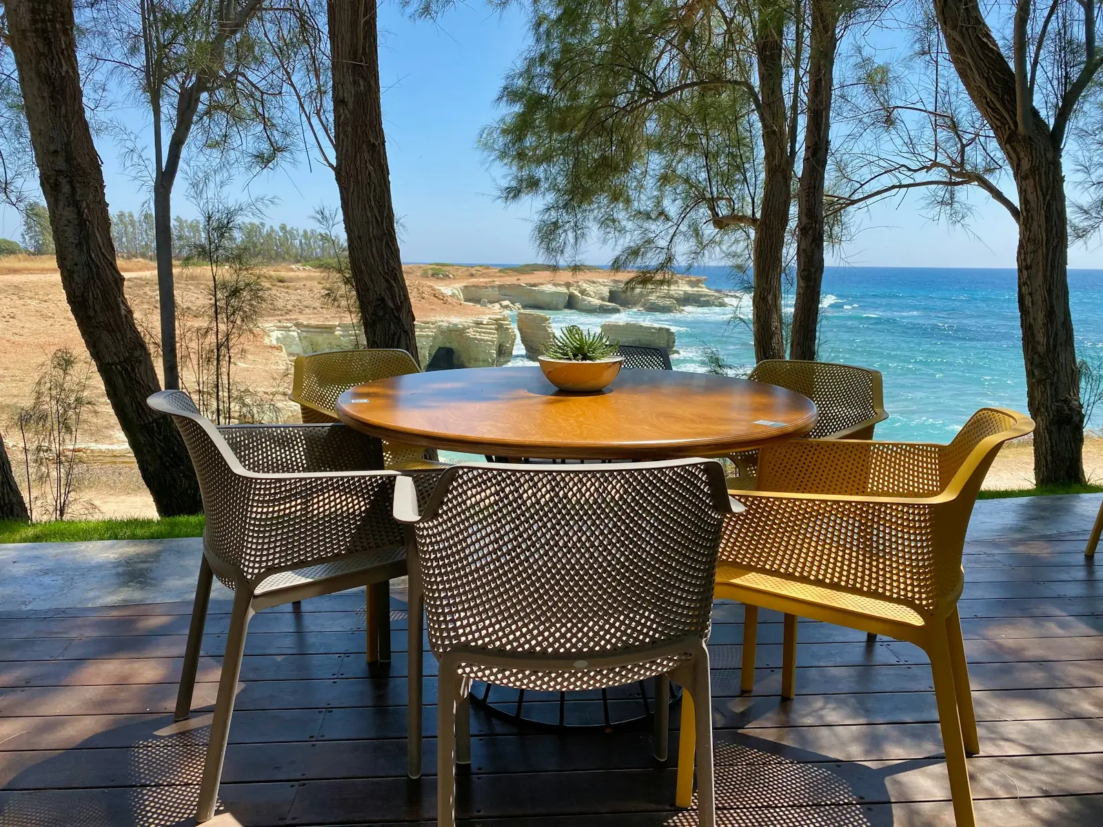 brown wooden table with chairs